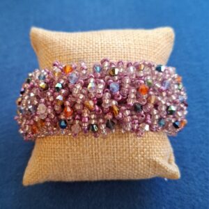 Armband i rosa toner
